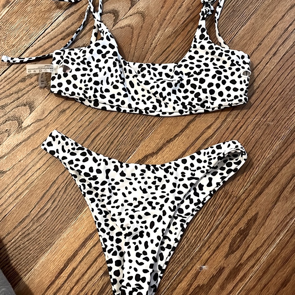 New, thong cow print bathing suit size small